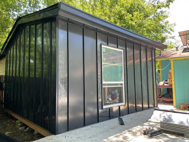 Black standing seam metal wall panels for Roof Inspection in Putnam Valley